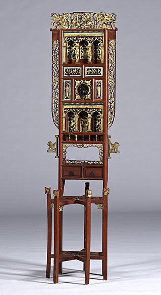 Chinese Carved Umbrella Stand : Chinese Carved Umbrella Stand Chinese. A polychrome and gilt umbrella stand with pierced floral, bird and figural carvings, having a reflective roundel, two drawers with dovetail construction, decor