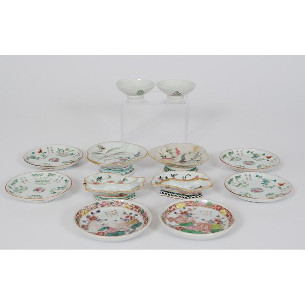 Chinese Tablewares : Chinese Tablewares Chinese. A twelve-piece group of painted, porcelain tablewares including two footed dishes, two segmented leaf-shaped dishes, two soy sauce bowls, a pair of saucers, and fo