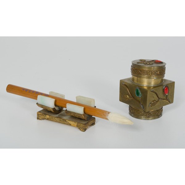 Chinese Desk Set : Chinese Desk Set Chinese. A desk set including a brass lidded box with red and green cabochons marked China, a brush with calligraphic script, and a brass brush holder with hardstone rests marked Ma
