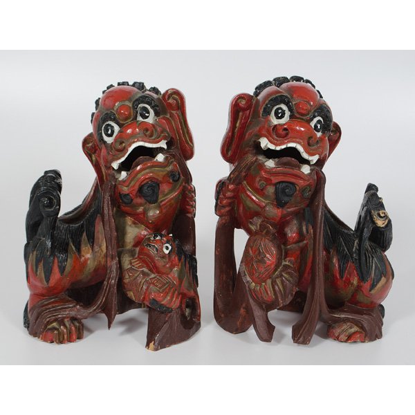 Chinese Carved Wood Foo Dogs : Chinese Carved Wood Foo Dogs Chinese. A pair of carved and painted wooden foo dogs in red, black and white, unmarked; ht. 14, lg. 10.75 in.