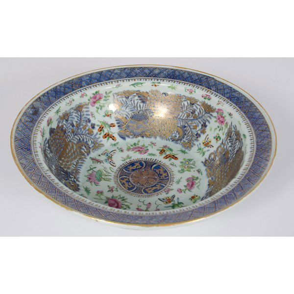 Japanese Gilt Bowl : Japanese Gilt Bowl Japanese. A gilt ceramic bowl with deep sloping sides, the interior depicting butterflies and flowers on a white ground, unmarked; dia. 16.5 in.