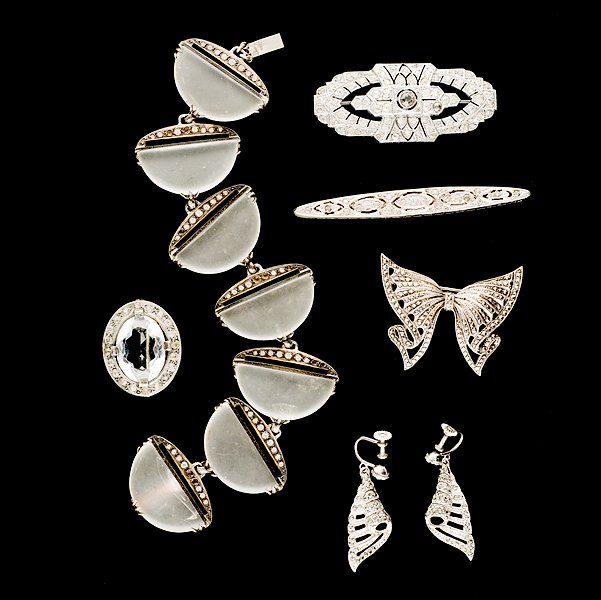 Art Deco & Marcasite grouping of Brooches and Brace: Art Deco & Marcasite grouping of Brooches and Bracelet. A grouping of Marcasite jewelry composed of brooches and a bracelet; all signed pieces are stamped.