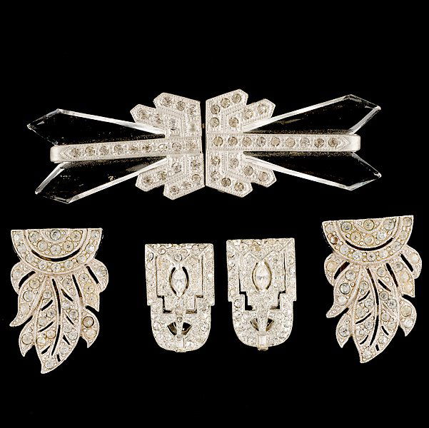 Unsigned Art Deco Dress Clip Set : Unsigned Art Deco Dress Clip Set A grouping of unsigned jewelry composed of a brooch and two pair of dress clips; all signed pieces are stamped.