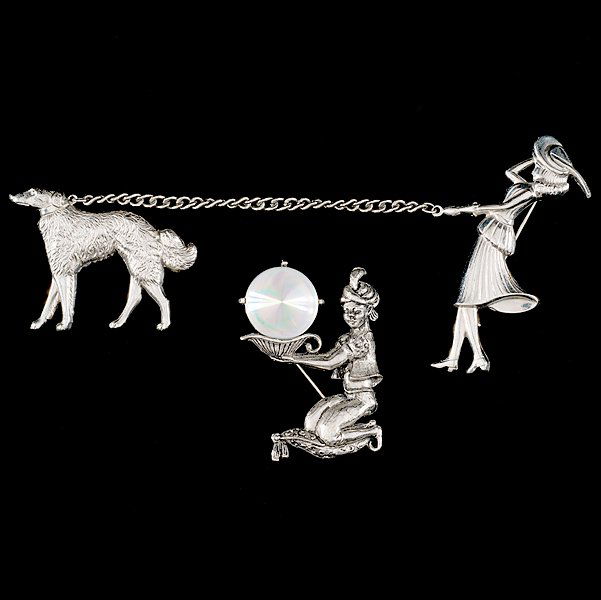 Coro Duette Pin and Jewelarama Brooch : Coro Duette Pin and Jewelarama Brooch A duo of Coro and Jewelarama brooches composed of mixed metals and a duette style; all signed pieces are stamped.