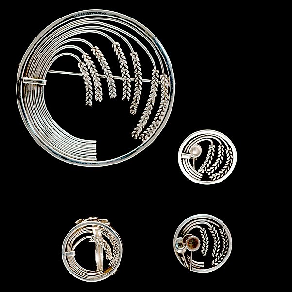 George Jensen Pin/Ring/Earring Set : George Jensen Pin/Ring/Earring Set A grouping of George Jensen composed of a pin, a ring and a pair of earrings; all signed pieces are stamped.