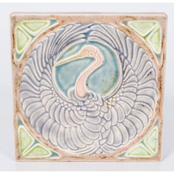 Rookwood Bird Trivet : American, a Rookwood pottery trivet decorated with a molded design of a exotic bird, impressed Rookwood logo, dated 1922, shape #2047; sq. 5.5 in.