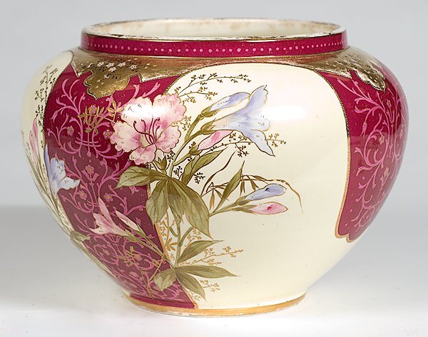 Royal Bonn Jardiniere : Germany. A Royal Bonn jardiniere with floral motif, bottom stamped with Bonn, crowned shield having stylized F-A-M / 1755; ht. 10 in.