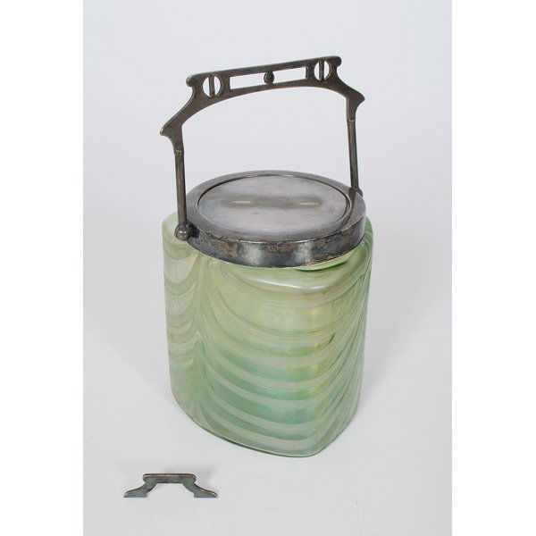 Loetz Covered Jar : Bohemian, a three sided art glass jar having a metal lid and handle, attributed to Loetz; ht. 5.5 in.
