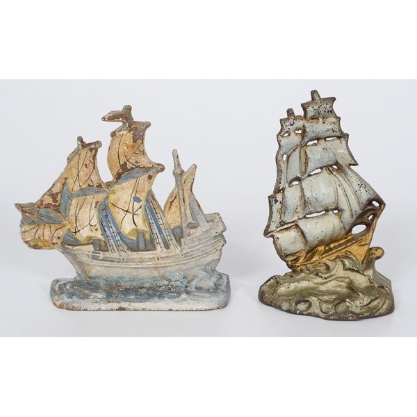 Sailing Ship Cast Iron Doorstops : American, a cast iron a painted Mayflower ship doorstop, marked Mayflower 52 Eastern Specialty Mfg Co.; ht 8.25 in.; plus, a painted cast iron sailing ship, unmarked; ht. 8.5 in