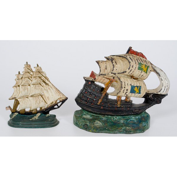 Sailing Ships Cast Iron Doorstop : American, two painted cast iron doorstops depicting sailing ships, largest marked "Albany FDY/167 "; largest ht. 8.5 in