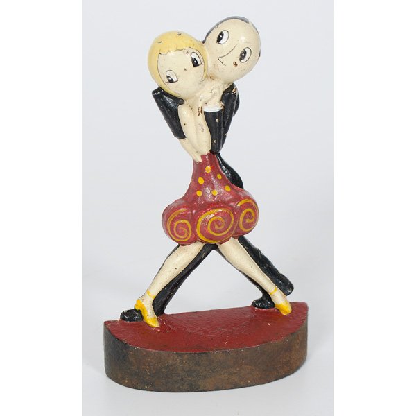 Charleston Dancers Cast Iron Doorstop : American, a painted cast iron doorstop of Charleston Dancers, marked Fish on front of base, produced by the Hubley FDY Co; ht. 8.75 in.