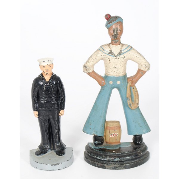 Rare Littco Sailor Cast Iron Doorstop : American, a rare painted cast iron sailor doorstop, made by Littco Products; ht. 11.5 in; Plus a painted sailor doorstop, originally by "Crumling", unmarked, ht. 9 in.