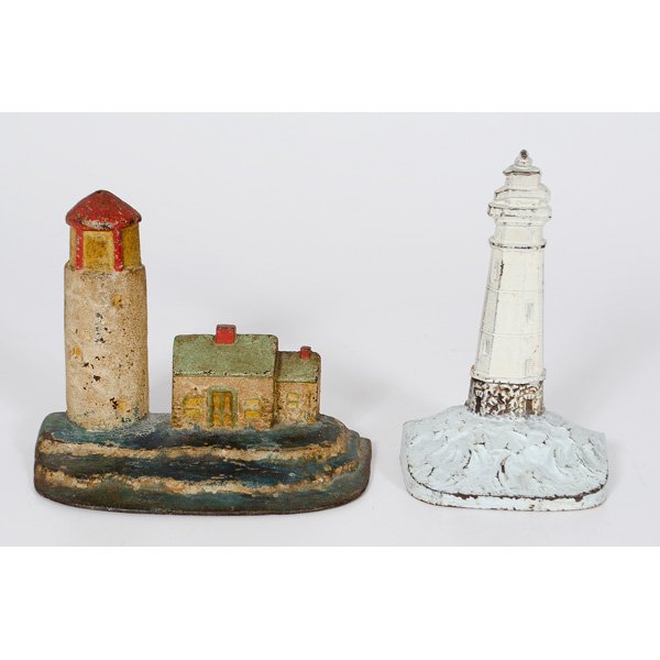 Light House Cast Iron Doorstops : American, a cast iron and painted Lighthouse doorstop, by National Foundry! marked 95; ht 6 in; AND a cast iron and painted Lighthouse doorstop by H.L. Judd Co; ht. 8 in.