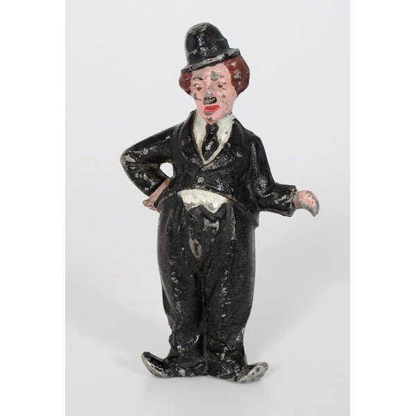 Charlie Chaplin Cast Iron Doorstop : American, a rare lead polychrome Charlie Chaplin doorstop; ht. 8 in