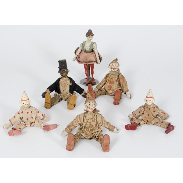 Schoenhut Circus Clowns, Rider, Plus : German, a group of Schoenhut circus clowns, ring master, and lady high wire acrobat all with handmade clothes, all with wooden shoes, all with jointed arms and legs; largest ht. 9 in.