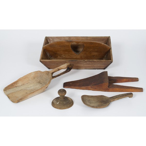 Walnut Knife Carrier, Plus : A walnut knife carrier with cutout handle and dovetail joints, PLUS two wooden paddles, a butter mold and a boot jack; knife carrier ht. 5.5 in. lg. 16.25 in.