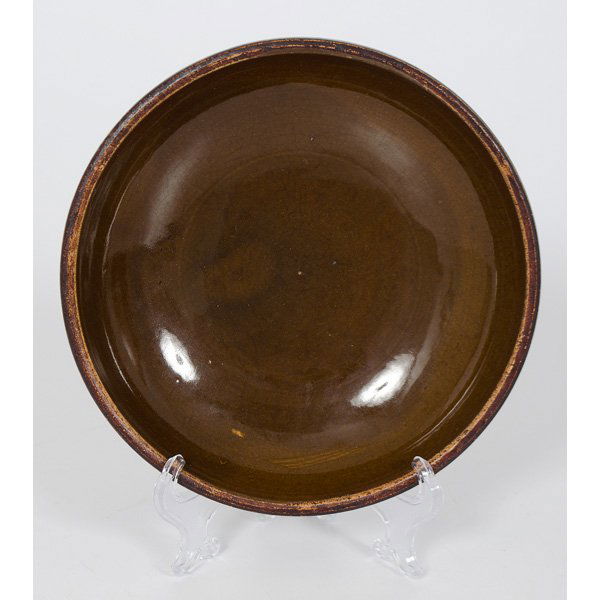 Redware Bowl : American, 20th century, brown glaze redware bowl; dia. 8 in.