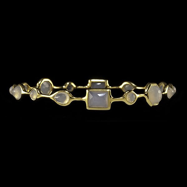 Ippolita 18k Faceted Chalcedony Bangle : Ippolita 18k yellow gold bangle containing 16 faceted chalcedony stones of varying shapes and sizes. Chalcedony ranges between 6.85 and 4.10 mm; dia. 2.5 in., wt. 8.7 dwts.