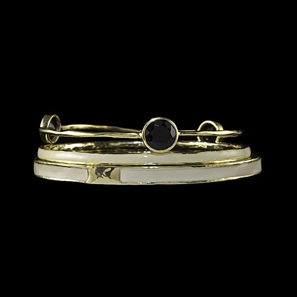 Ippolita 18k Bangles with Onyx and Enamel : Ippolita 18k yellow gold bangles including two hand-hammered pieces with ivory enameling, one piece with three evenly spaced faceted round onyx; dia. 3 in., wt. 16.8 dwts.