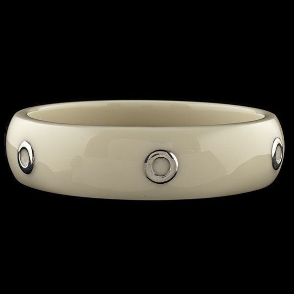 Ippolita Ivory Resin and Sterling Silver Bangle : Ippolita wide ivory-tone resin bangle with sterling silver inset circles; dia. 3 in.