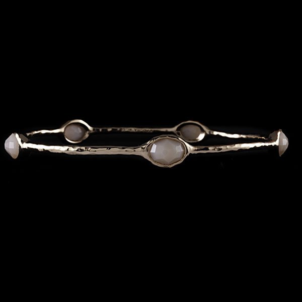 Ippolita Rosé and Rosy Quartz Bangle : Ippolita hand-hammered rosé bangle containing five faceted rosy quartz ovals. Quartz measures 8.32 x 6.44 mm; bangle dia. 3 in., wt. 7.5 dwts.