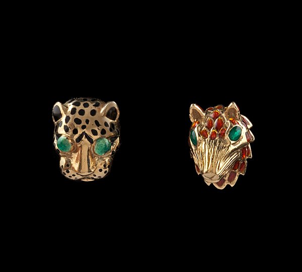 Duo of David Webb 18k Enamel Tie Clips : Two David Webb 18k yellow gold and enamel animal-form tie tacks including a jaguar with emerald cabochon eyes and a wolf; wt. 8.2 dwts.