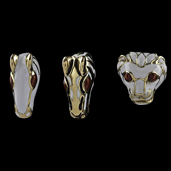 David Webb 18k Enamel Tie Pins : Three David Webb 18k yellow gold and enamel tie pins in the form of horse and lion heads, all with red enameled eyes; wt. 11 dwts.