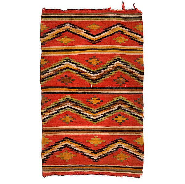 Navajo Transitional Weaving : hand-spun wool woven using colors of red, black, cream, yellow, and green; designed with alternating serrated and solid bands and diamonds, 79 x 49 in. ca 1900