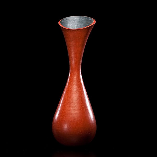 Judy Trim (1943-2001, England) : Red Hearth Bottle 1982 Earthenware; ht. 19, dia. 6 in. Influenced by Hans Coper and through him, Liz Fritsch, a new kind of vessel arrived, sometimes described as “Pot as Image” because it