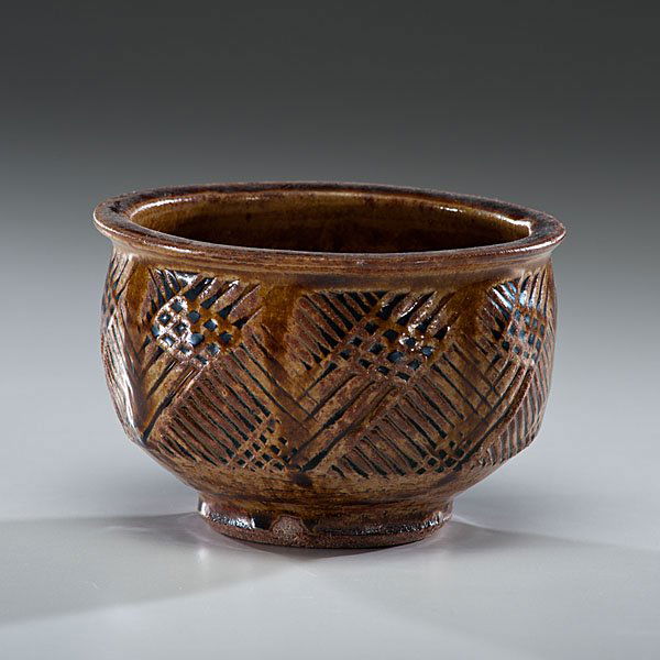 Warren MacKenzie (1924, USA) : Incised Footed Bowl ca 1983 Stoneware; ht. 3.75, dia. 5.75 in. Shown: Warren MacKenzie, Jane Hartsook Gallery, Greenwich House Pottery, NY, 1981. Provenance: Daniel Jacobs and Derek Mason Colle
