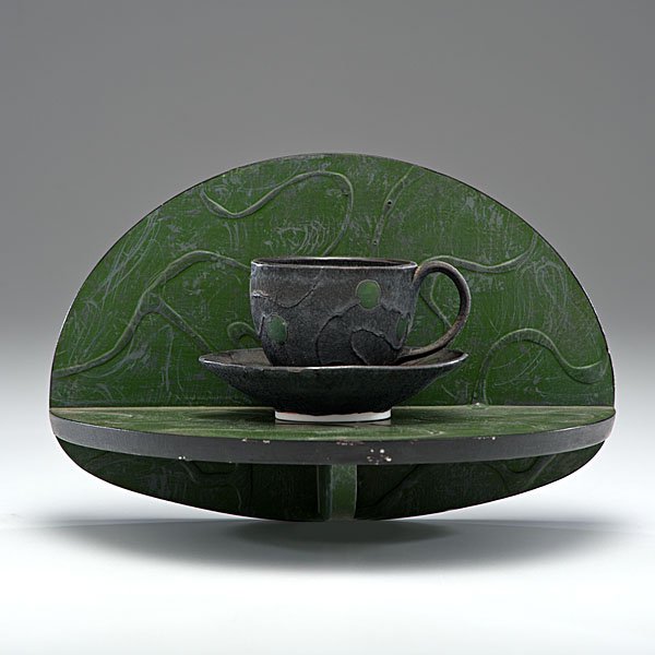 Anne Smith (1958, USA) : Cup & Saucer with Shelf 1986 Ceramic and wood; ht. 3.5, dia. 5.5 in., overall ht. 9, wd. 12 in. Shown: Anne Smith, Garth Clark Gallery, NY 1986. Provenance: Daniel Jacobs and Derek Mason Co