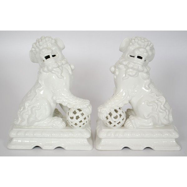 Pair of Porcelain Foo Dogs : Continental, 20th Century. Pair of two porcelain foo dogs, stamped inside base ETHAN ALLEN/ 43-3040/R.N. 48864/ MADE IN/ ITALY; Ht. each 16.5 in.