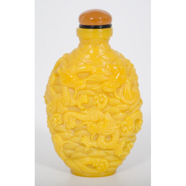 Chinese Yellow Peking Glass Snuff Bottle : Chinese, a yellow Peking glass snuff bottle, large in size, with dragon relief; ht. 3 in.
