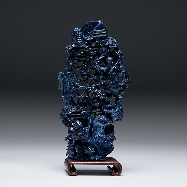 Chinese Blue Sodalite Figural Group : Chinese. An openwork carved figural group in blue hardstone, possibly sodalite, with a God of Longevity holding a ruyi scepter and seated on a bird, next to a standing Guanyin with two other figure