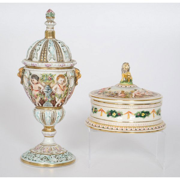 Italian Faience Urn and Dish : Italian. An assembled group of Italian faience including a lidded urn with figural motifs in relief on cream ground, floral finial, and marked for Capodimonte and Italy, and a covered dish with