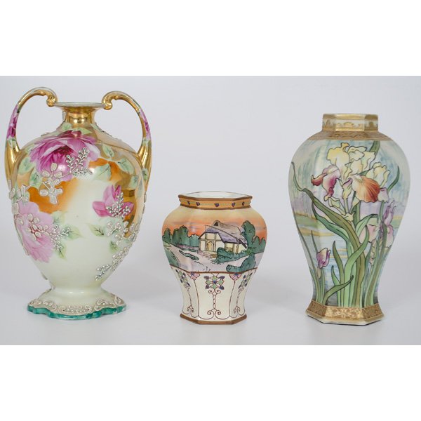 Three Hand Painted Nippon Vases : Lot of three includes a two-handled vase with hand painted roses, raised design, and gilt trim, marked Handpainted Nippon Wheelock in blue; Ht. 9 in.; a hexagonal-shaped vase with hand-painted lilie