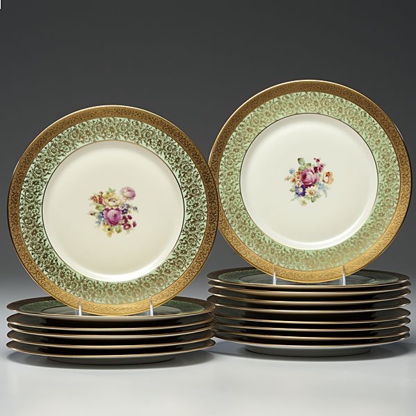 Bavarian Heinrich Dinner Plates : Continental, 1925-1930. Fifteen dinner plates, by Picard, each with centered hand-painted flowers, the plate's rim with green heightened by gilding, the edge with a gold band; marked H & Co. / Selb / 