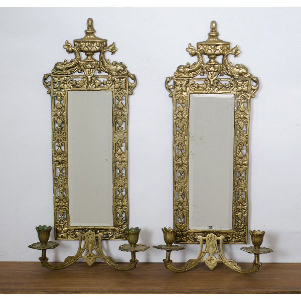 Brass Mirrored Wall Sconces : English, 19th century. A pair of cast brass dolphin and urn design wall sconces with beveled mirrors, each having two arms; ht. 20.5, wd. 10, dp. 3.5 in.