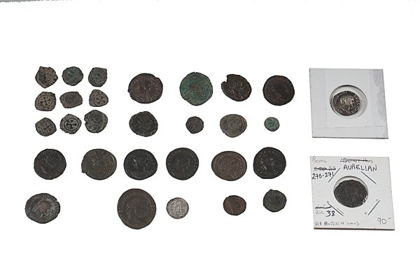 Roman Coins, Plus : Roman, a collection of eighteen Roman coins in mixed metals, plus one circa 14th century Hungarian coin, one circa 6th century Byzantine coin, and nine feudal coins; largest dia. 1 in.
