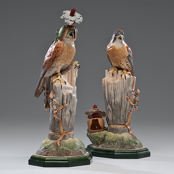 Boehm Kestrel : Boehm Kestrel American. A pair of Boehm Kestrel figures, both perched atop a log, one wearing a hood and the other with the hood beside it, both marked Boehm / Limited Edition / Kestrel on botto