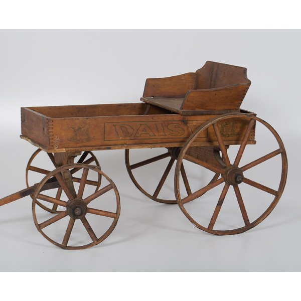 Child's Daisy Buckboard : Child's Daisy Buckboard American, late 19th/early 20th century. A child's wagon, with wooden spokes and iron rims, the wagon bed with original painted decoration and original sliding seat; ht. 20, l
