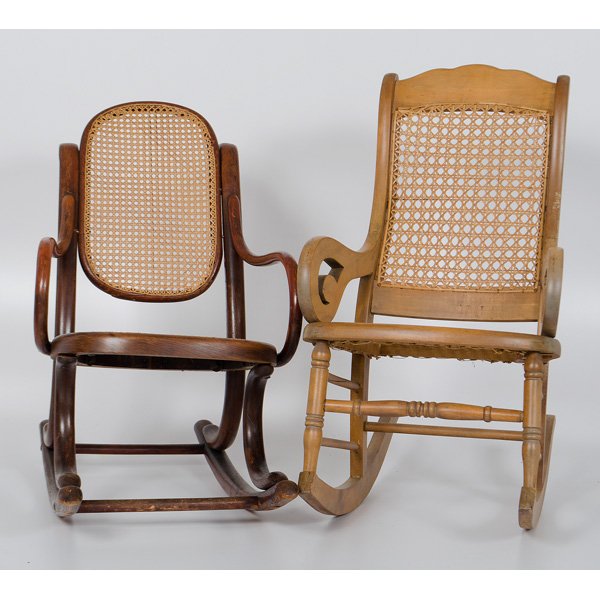 Child's Rocking Chairs : Child's Rocking Chairs American, late 19th/early 20th century. Two child's rocking chairs with cane seats and backs, one of bentwood, the other having scrolled arms and turned legs; largest ht. 27 i