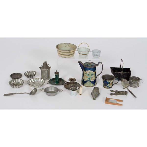 Child's Miniature Tin Tablewares : Child's Miniature Tin Tablewares An assembled group of child's miniature tin table and kitchenwares, including candlesticks, coal hod, toileware coffe pot and cup. milk cans, and fluted pans; lar