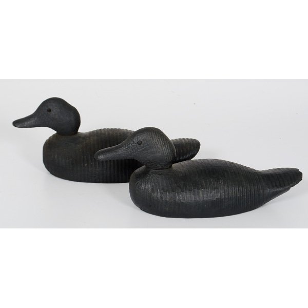 Pair of Ebonized Wood Duck Decoys : Pair of Ebonized Wood Duck Decoys Two wooden duck decoys in black paint with incised eyes and removable heads; ht. 6, wd. 4.5, dp. 17 in.