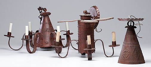Reproduction Early American Lighting : Reproduction Early American Lighting American. Three pieces of reproduction punched tin lighting including two chandeliers and a hanging lantern; largest chandelier dia. 25.5 in.