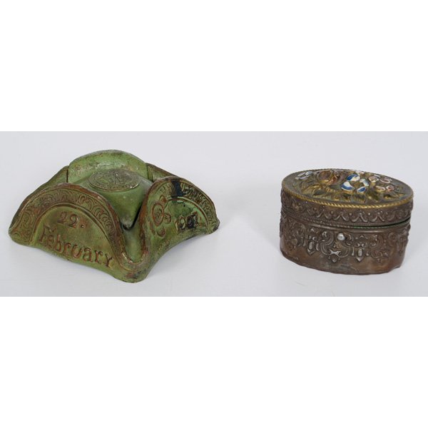 Commerative Inkwell, Plus : Commerative Inkwell, Plus American, 20th century. A cast metal commemorative inkwell in the form of a tricorn hat with removable top cast with SONS OF THE REVOLUTION / 1776 / 1883 in central medalli