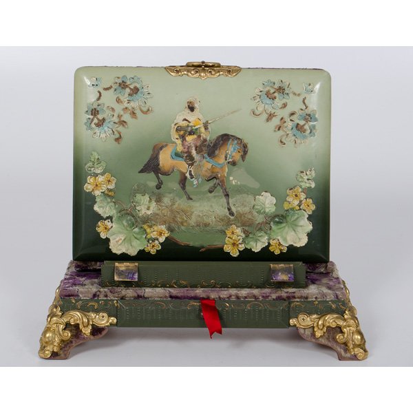 Victorian Photo Album : Victorian Photo Album 19th century. A Victorian photo album with painted cover depicting an exotic Arab on horseback surrounded by floral motifs, resting on a metal and carpeted stand; ht. 12