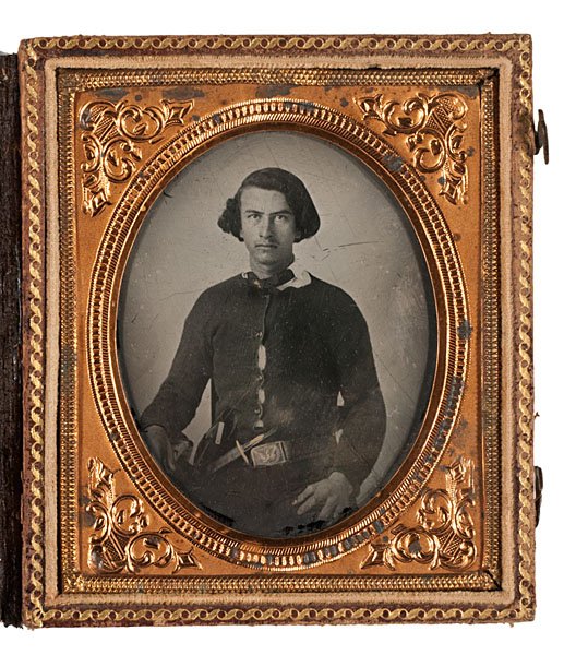 Civil War 6th Plate Ambrotype of Double-Armed Vol.: Civil War Sixth Plate Ambrotype of Early Double-Armed Volunteer A standout clear plate ambrotype of an unidentified young dandy armed with a Sheffield-type belt knife and holstered pistol. Under a t