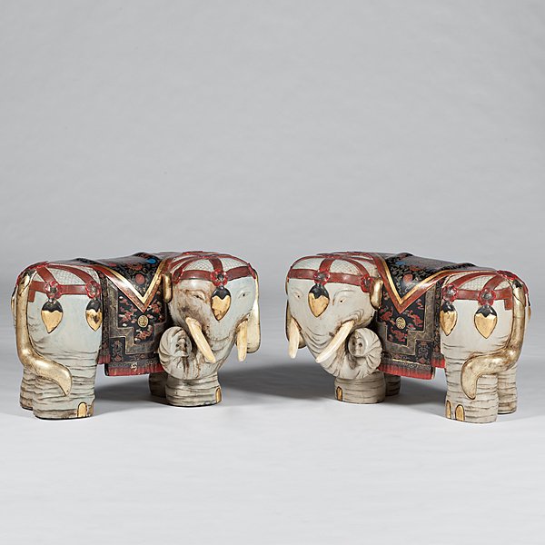 Elephant Garden Seats : Elephant Garden Seats Asian, 20th century. A pair of polychrome molded plaster elephants with turned heads, protruding tusks and flat backs with painted saddles; ht. 22 , lg. 34 in.