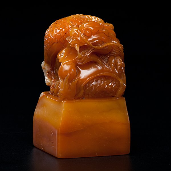 Chinese Soapstone Dragon Seal : Chinese Soapstone Dragon Seal 20th century. A well carved and polished dragon soapstone seal, with intact archaic six character seal on underside; ht. 4 in.